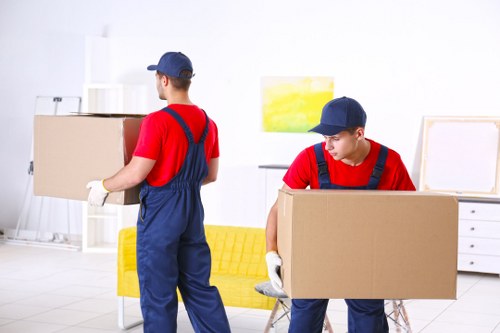 Local house removals planning in Barking with moving boxes and furniture