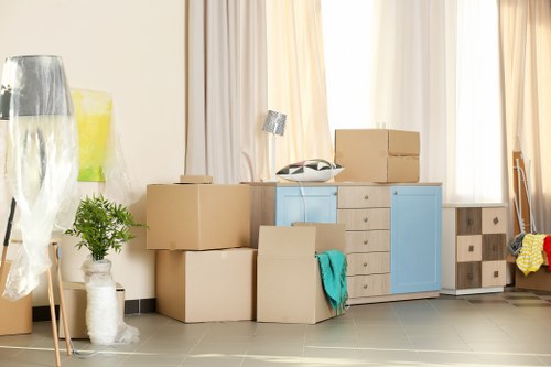 Removal team planning a Barking house move with boxes and furniture