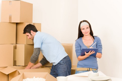 Packed boxes and household items ready for removal