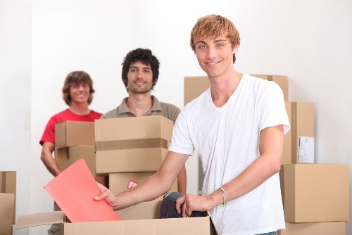 Barking van moving boxes and furniture through residential streets